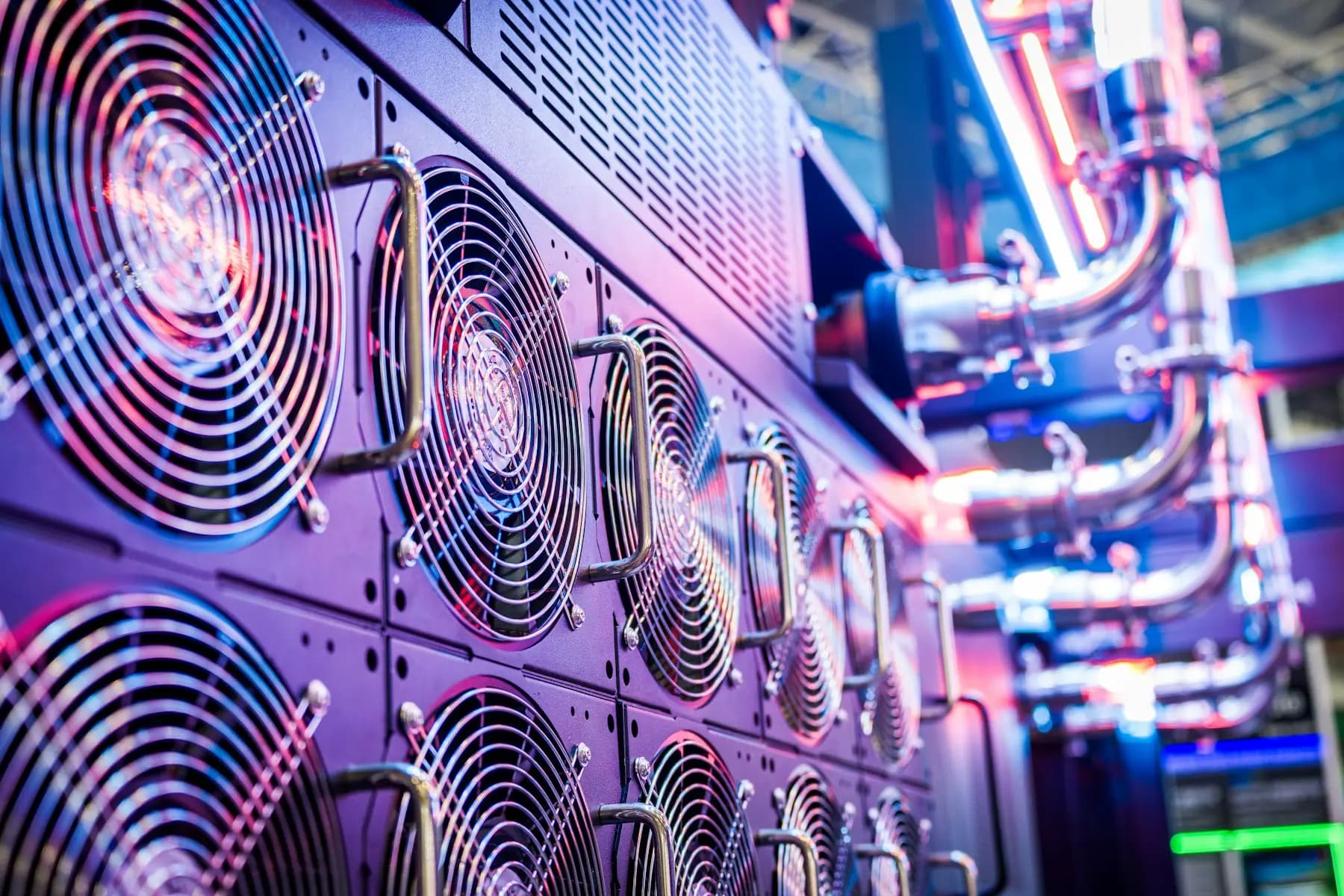 Rows of cooling fans and cabling inside a data center enclosure